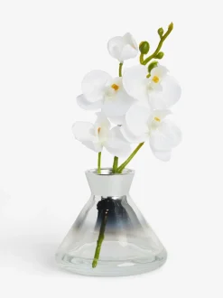 Artificial Orchid In Small Glass Vase