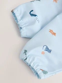 Blauw Dino Jungle - Slabbetje met mouwen voor spenen en voeden