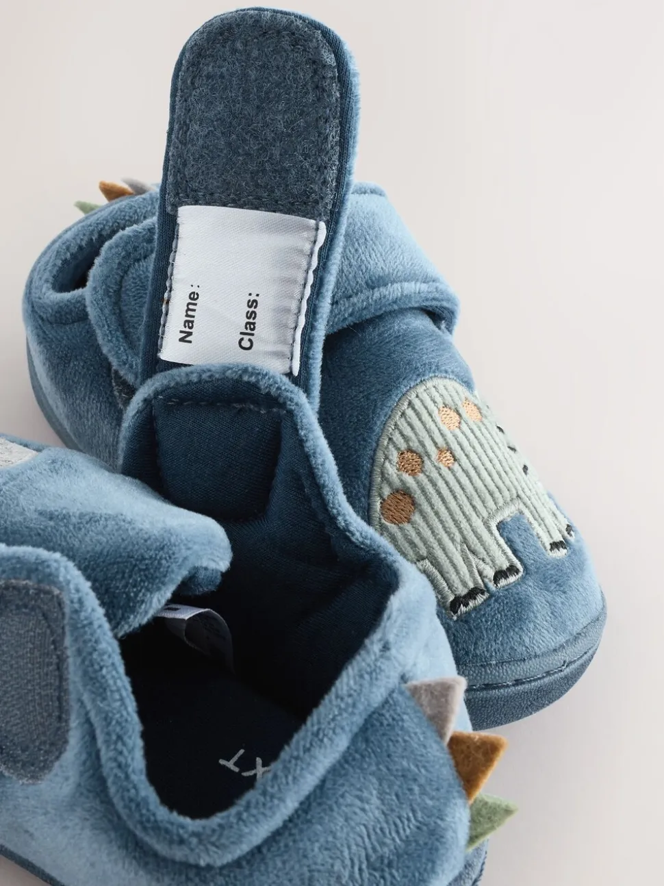 Blauw met dinosaurus - Warm gevoerde pantoffels met kuipzool