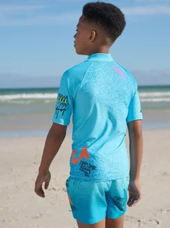 Blauw met graffitiprint - Surfhemdje (1,5 - 16 jr)