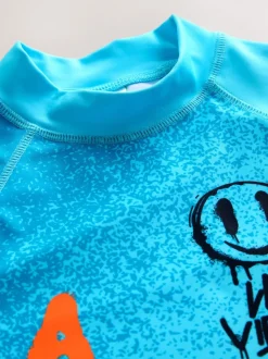 Blauw met graffitiprint - Surfhemdje (1,5 - 16 jr)
