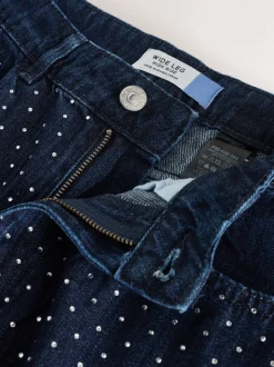 Blauw met wassing - Versierde jeans met wijde pijpen
