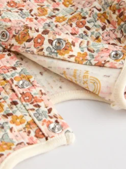 Blauw/crème/koraal Ditsy - Verpakking van 4 babyrompers met lange mouwen en ruches (0mnd-2jr)