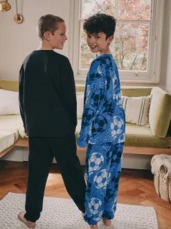 Blauw/zwart met voetbal - Verpakking van 2 pyjama's met lange mouwen (3-16 jr)