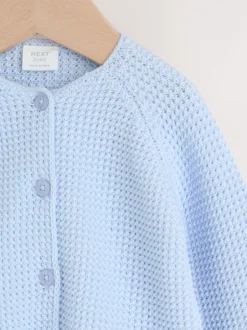 Blue Peplum - Gebreid babyvest (0 mnd- 2 jr)