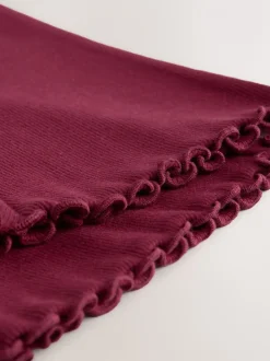 Bordeauxrood - Geribbelde flare legging (3 mnd-7 jr)