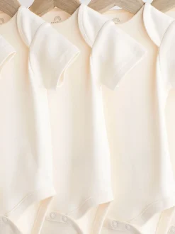 Crème - 5 Must-have rompertjes met korte mouwen