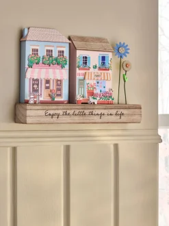 Decoratief houten tafereel met lentehuis ornament
