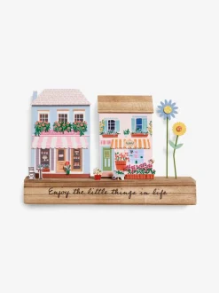 Decoratief houten tafereel met lentehuis ornament