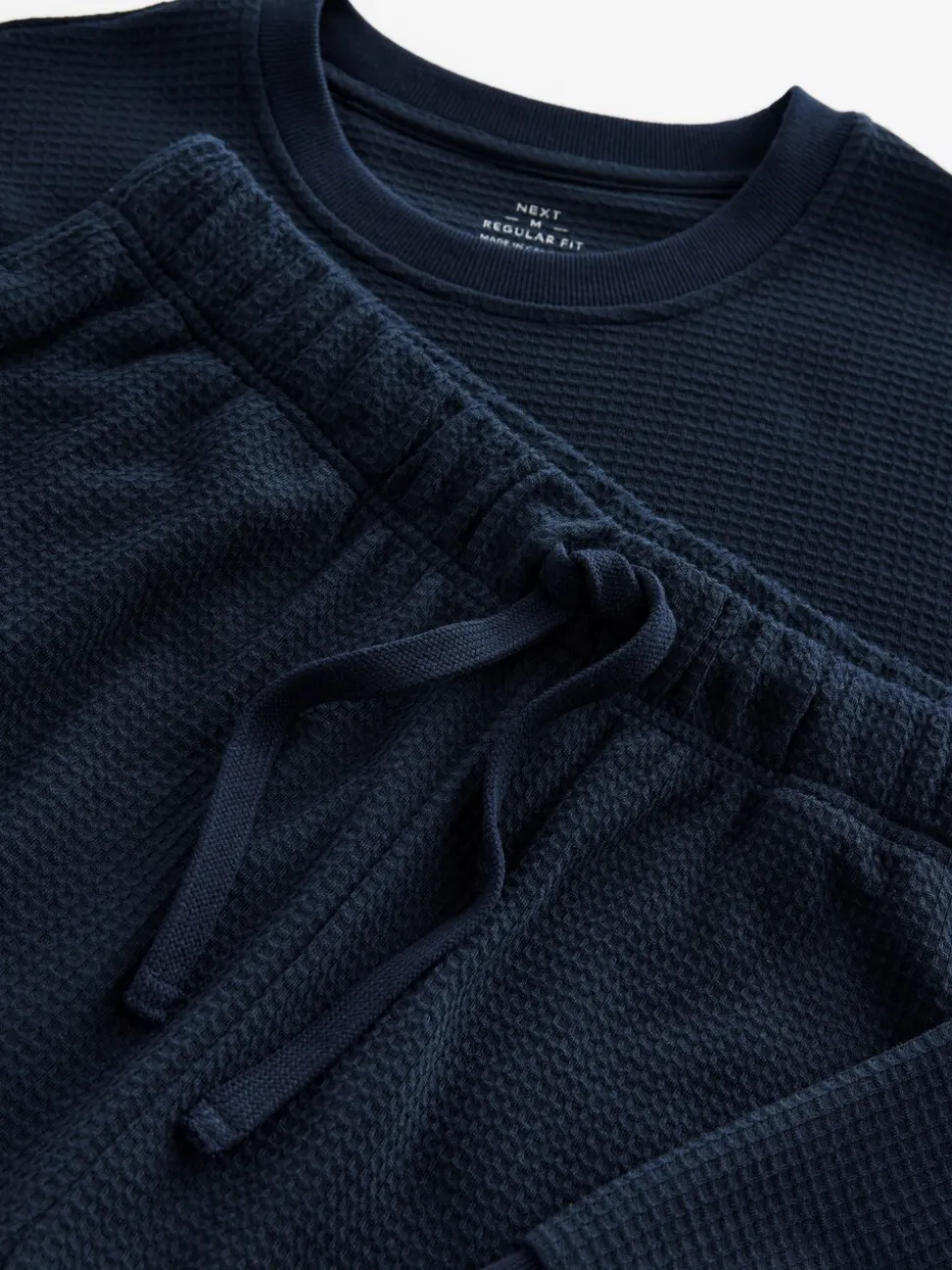 Donkerblauw - Zachte pyjama met top met wafeldessin en lange mouwen