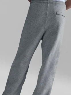 Donkergrijs gemêleerd - Nike Club Fleece joggingbroek met wijde pijpen
