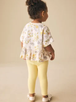 Ecru met bloemenprint - T-shirt met peplum en korte mouwen (3mnd -7jr)