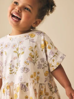 Ecru met bloemenprint - T-shirt met peplum en korte mouwen (3mnd -7jr)