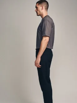 Effen zwart - Klassieke stretchjeans met standaard taps toelopende pasvorm