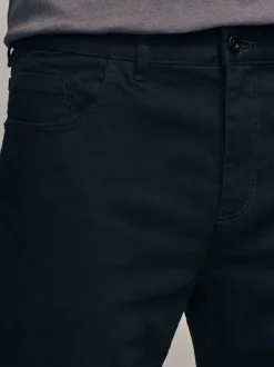 Effen zwart - Klassieke stretchjeans met standaard taps toelopende pasvorm