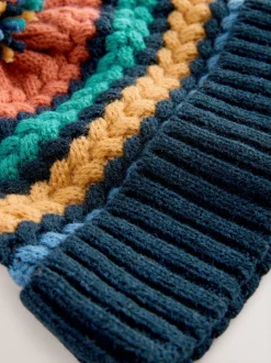 Fel kabelgebreid - Gebreide Baby muts met pompon (0mnd -2jr)