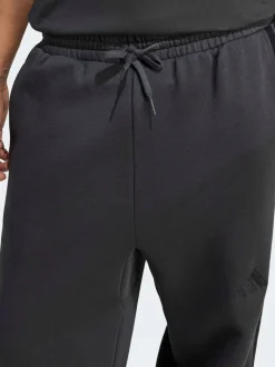 Grijs - adidas Essentials Three Stripes Fleece Wide Leg Trousers