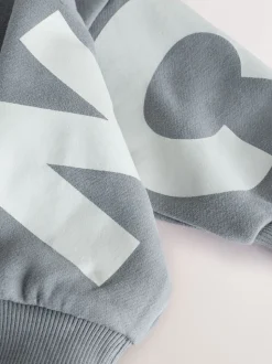 Grijs - Jersey sweatshirt met ronde hals en print op de rug (3mnd -7jr)