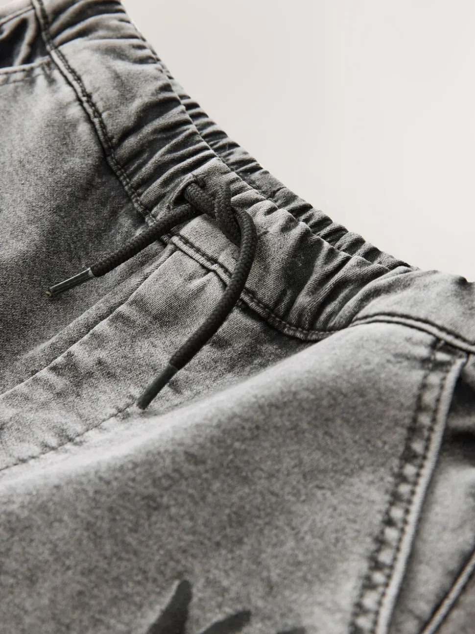 Grijs met graffiti - Cargo jeans met elastische taille (3-16 jr)
