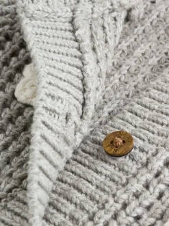 Grijze gehaakte bloemen - Gebreid babyvest (0 mnd- 3 jr)