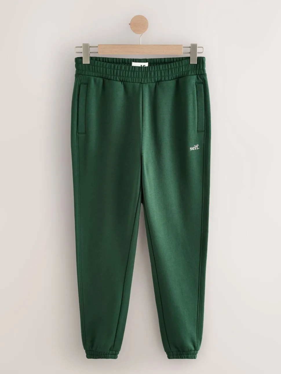 Groen - Self. joggingbroek met boorden