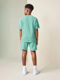 Groen - Set van T-shirt met textuur en korte mouwen en shorts (3 - 16 jr)