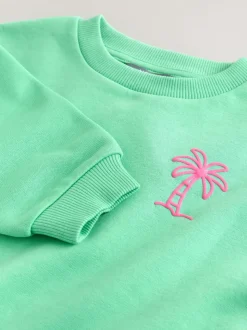 Groen met palmboomprint - Sweatshirt met ronde hals en all-over print (3 mnd - 7 jr)
