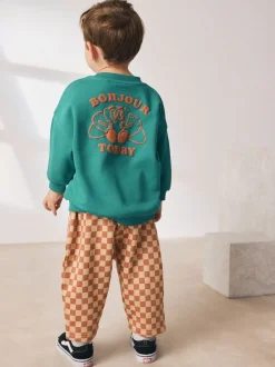 Groene croissant - Set met sweatshirt en joggingbroek met strepen (3mnd-7jr)