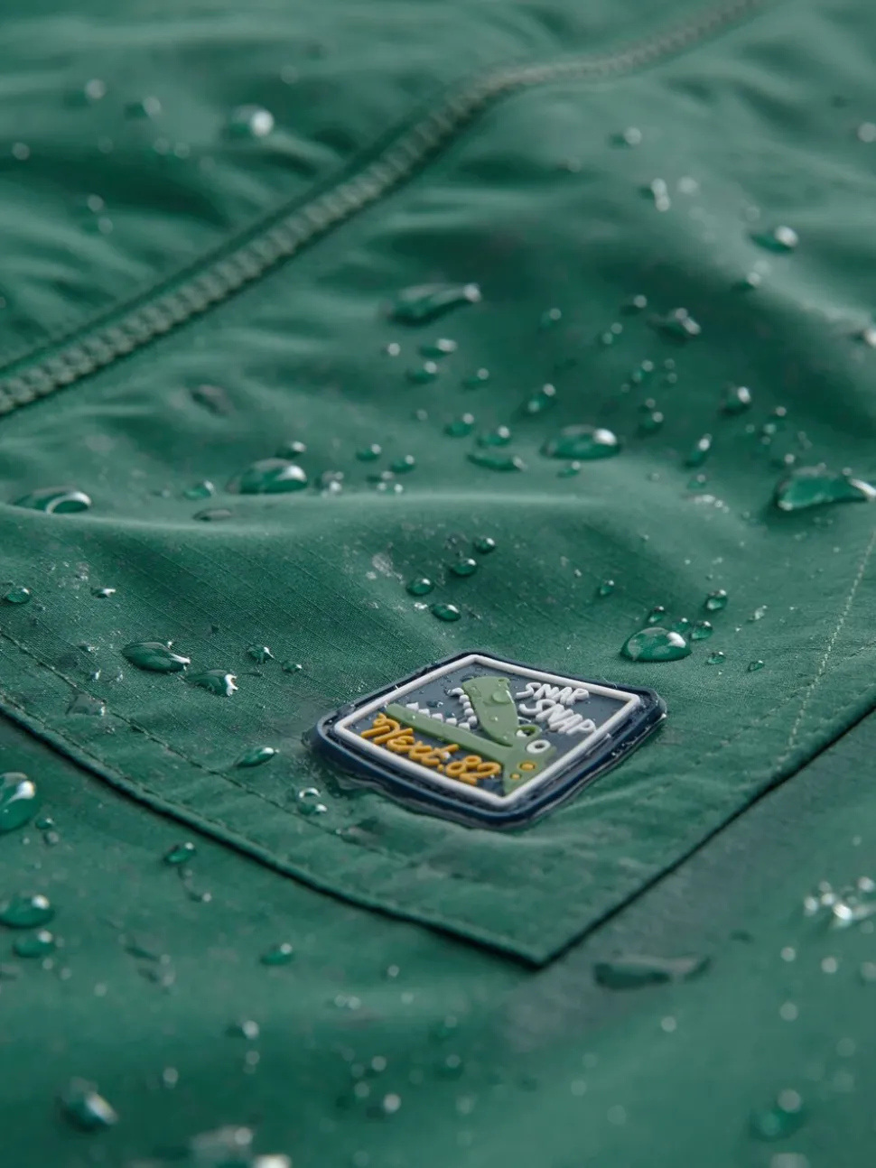 Groene krokodil - Waterdicht regenpak met fleecevoering (3 mnd-7 jr)