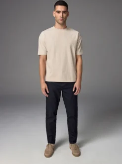 Indigo blauwe wassing - Klassieke stretchjeans met standaard taps toelopende pasvorm