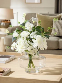 Kunstbloemenarrangement in glazen vaas