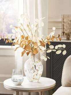 Kunstbloemenboeket van eucalyptus en confetti vaas