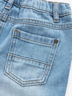 Lichtblauwe denim - Jeans met geplooide voorkant (3mnd-7jr)