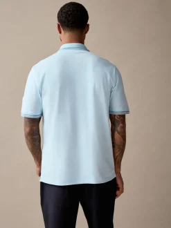 Lichtblauwe ottoman - Regular fit poloshirt met korte mouwen en contrasterende randen