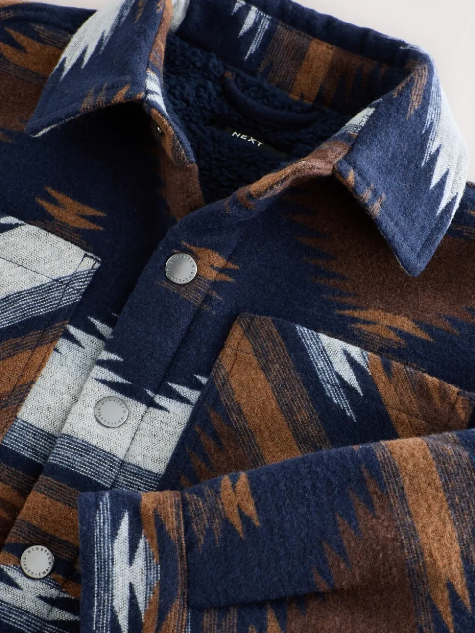 Lichtbruin/Marineblauw Ikat-patroon - Gevoerde shacket (3-16jr)