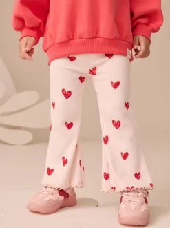 Lichtroze met hartje - Geribbelde flare legging (3 mnd-7 jr)