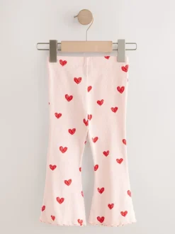 Lichtroze met hartje - Geribbelde flare legging (3 mnd-7 jr)