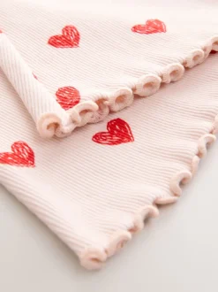 Lichtroze met hartje - Geribbelde flare legging (3 mnd-7 jr)
