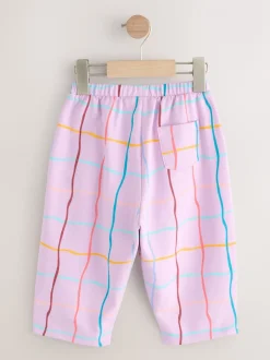 Lilapaars geruit - Broek met structuur en wijde kortere pijpen (3mnd -7jr)