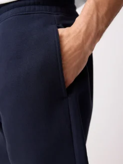 Marineblauw - Geborstelde jersey shorts met ritszakken