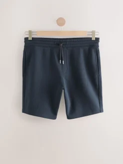 Marineblauw - Geborstelde jersey shorts met ritszakken