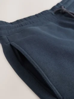 Marineblauw - Geborstelde jersey shorts met ritszakken