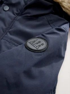 Marineblauw - Zware regenbestendige parka met imitatiebontrand (3-16jr)