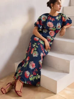 Marineblauw met bloemenprint - Midi-jurk met print en pofmouwen