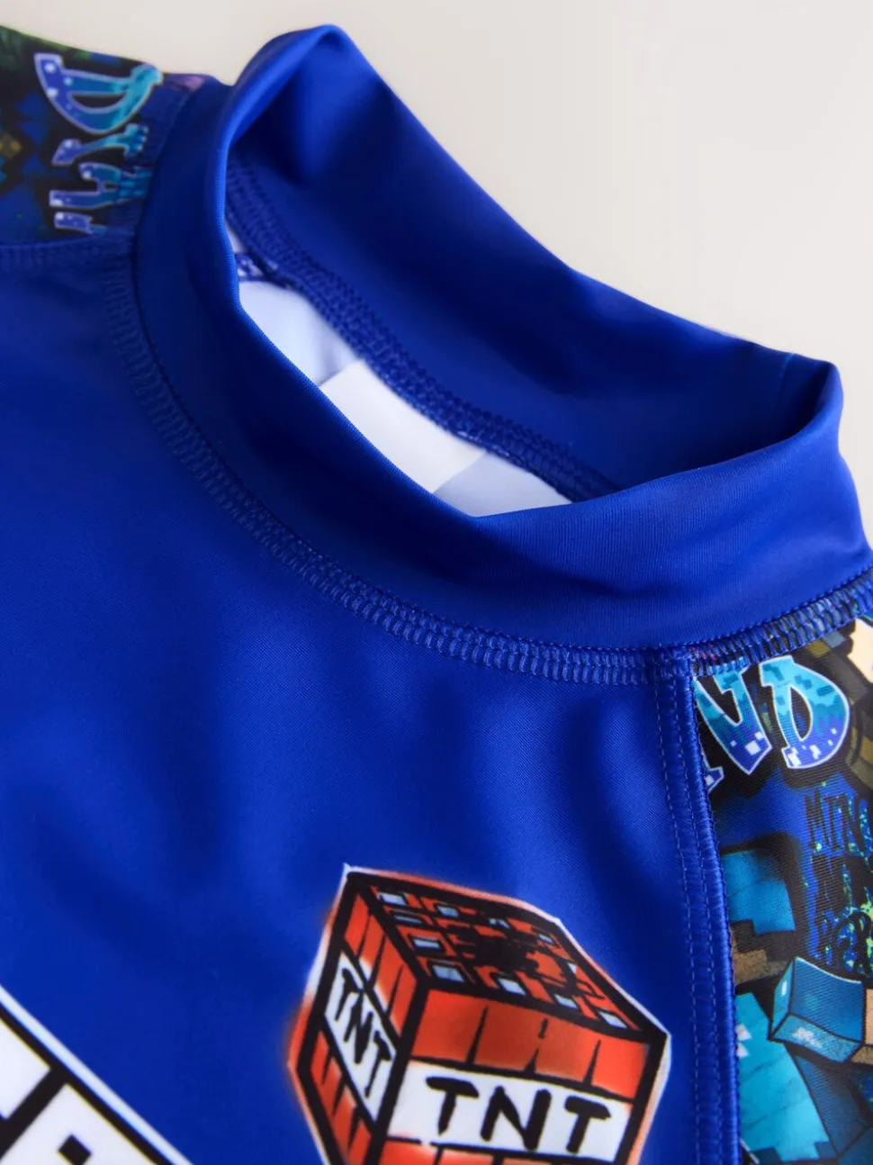 Marineblauw met Minecraft-print - Surfhemdje (3-16 jr)