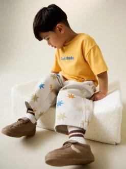 Meerkleurige sterrenprint - Wijde broek met elastische taille (3mnd-7jr)