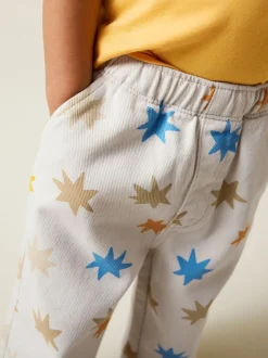 Meerkleurige sterrenprint - Wijde broek met elastische taille (3mnd-7jr)