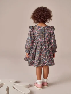 Met vrolijke print - Jurk met ruche en lange mouwen (3mnd-8jr)