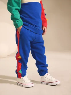 Multi Dinostekels - Set van zacht T-shirt met lange mouwen en joggingbroek (3mnd-7jr)