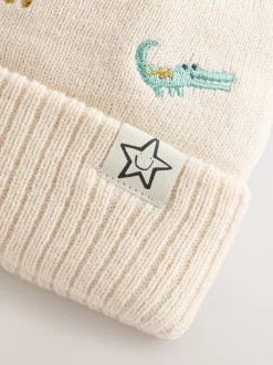 Naturel geborduurd met safariprint - Beanie-muts met pompon (3mnd-10jr)